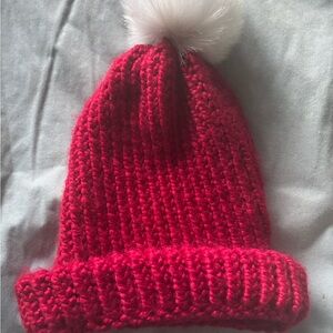 Beanie women's cable knit red with a white pom pom. Perfect for Christmas EUC
